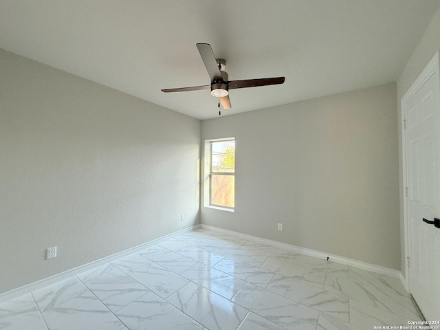 spare room featuring ceiling fan