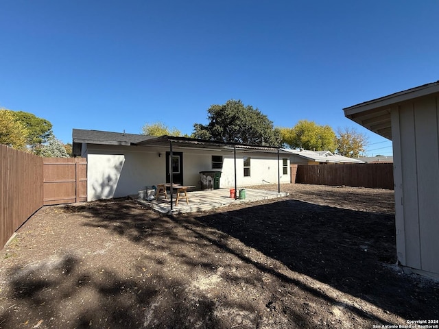 rear view of house with a patio area