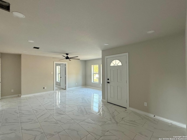 foyer with ceiling fan