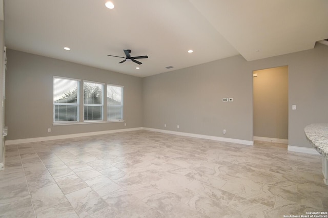 empty room featuring ceiling fan