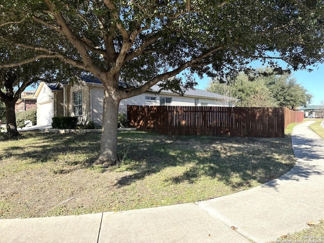 view of yard featuring a garage