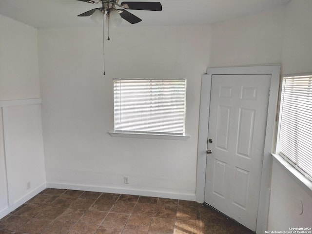 empty room with ceiling fan