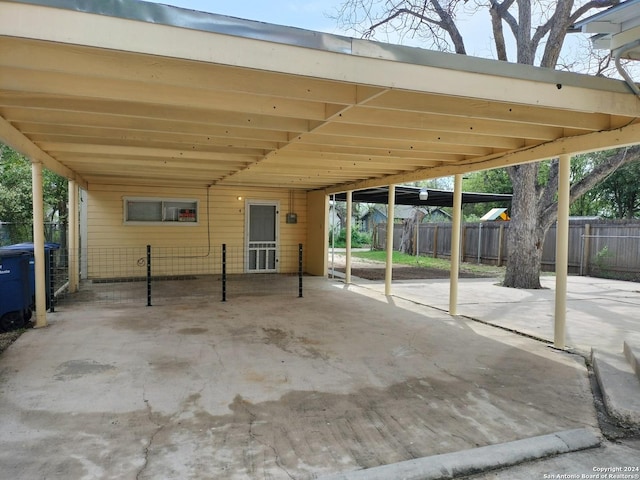 view of patio featuring a carport