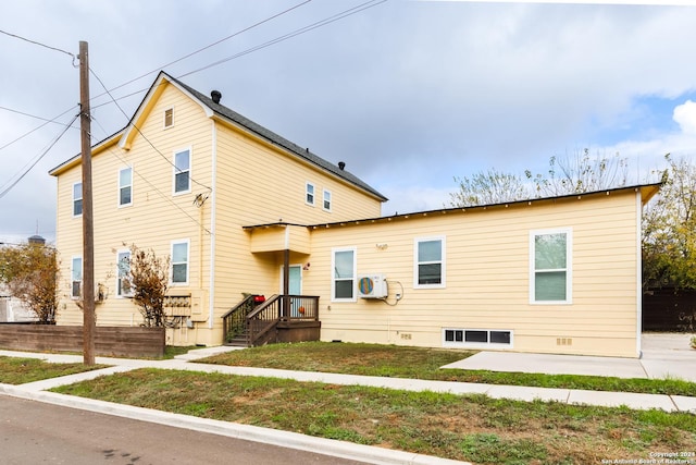 exterior space with a front yard