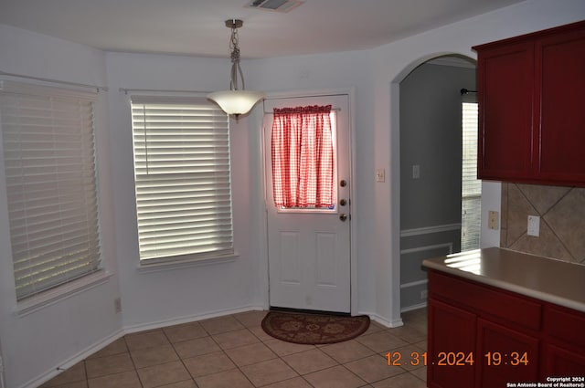 interior space featuring light tile patterned flooring