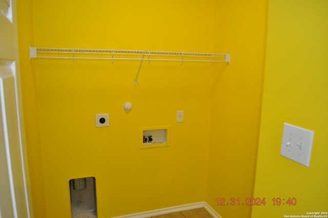 laundry area with electric dryer hookup and washer hookup