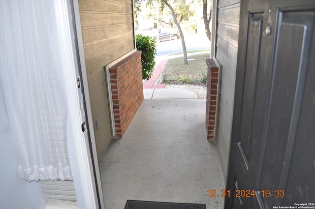 exterior space featuring concrete flooring