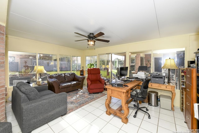 tiled office space featuring ceiling fan