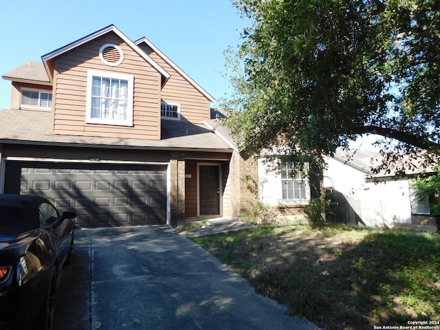 view of front of property with a garage