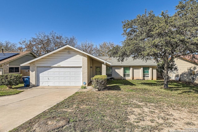 ranch-style home featuring a front lawn and a garage