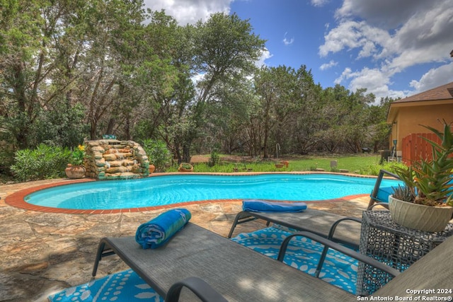 view of pool with a patio area