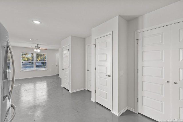 interior space featuring ceiling fan