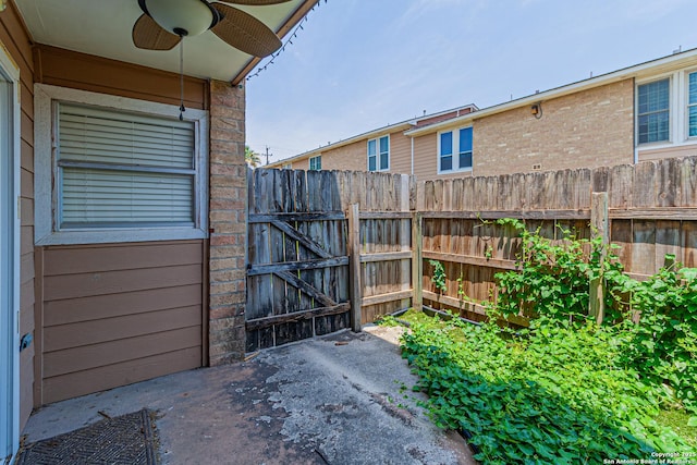 7322 Oak Manor Dr Unit 54, San Antonio, TX 78229 - view of patio featuring fence and ceiling fan