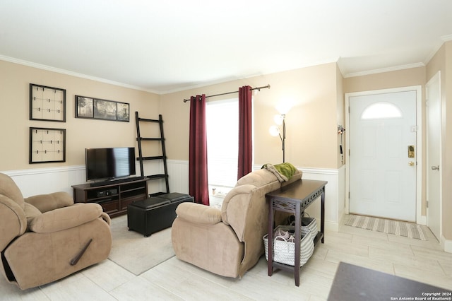 living room with ornamental molding