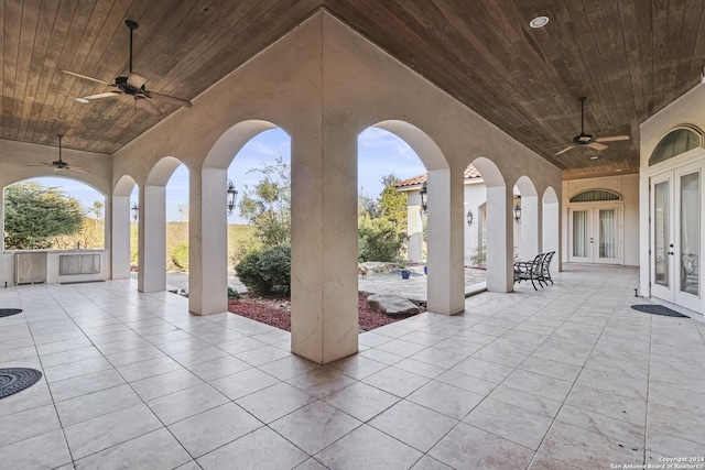 view of patio featuring french doors and ceiling fan