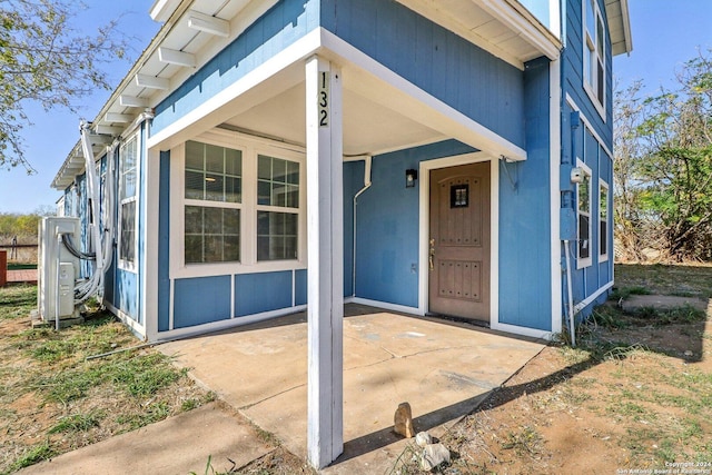 property entrance with a porch