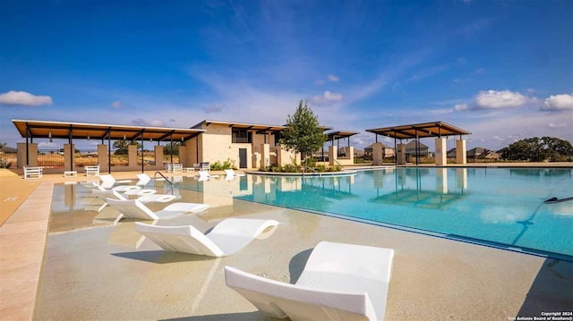 view of swimming pool featuring a patio