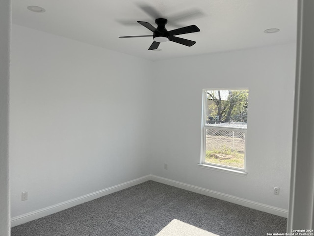 empty room with carpet and ceiling fan