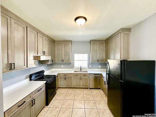 kitchen with black appliances, ventilation hood, sink, light tile patterned floors, and a textured ceiling