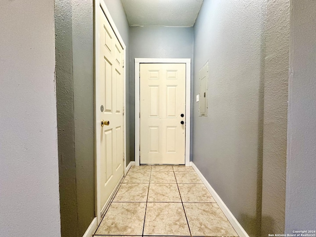 entryway featuring light tile patterned floors