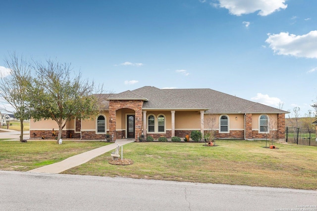 view of front facade with a front yard