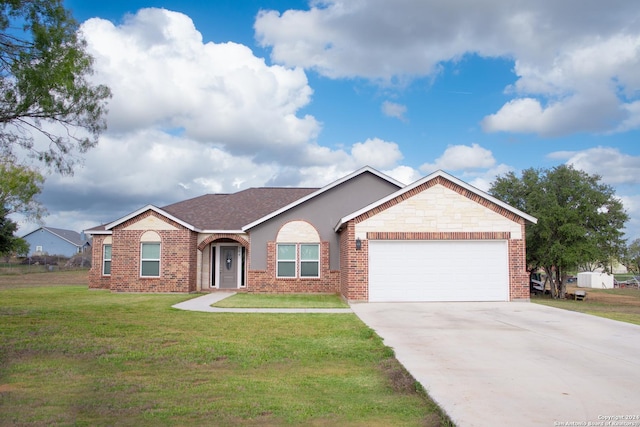 ranch-style home with a front yard and a garage