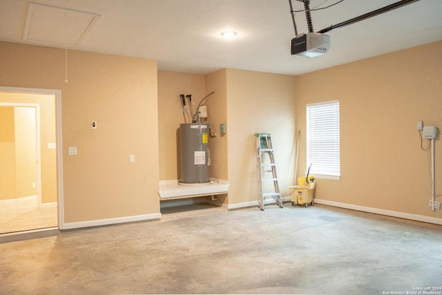 garage featuring water heater and a garage door opener