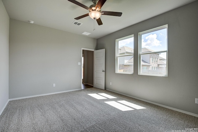 unfurnished bedroom with carpet flooring and ceiling fan