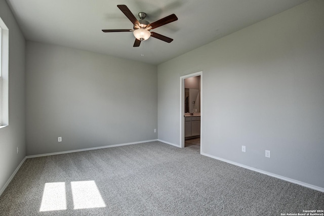 carpeted empty room with ceiling fan