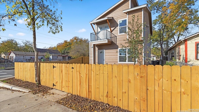 view of front of property with a balcony