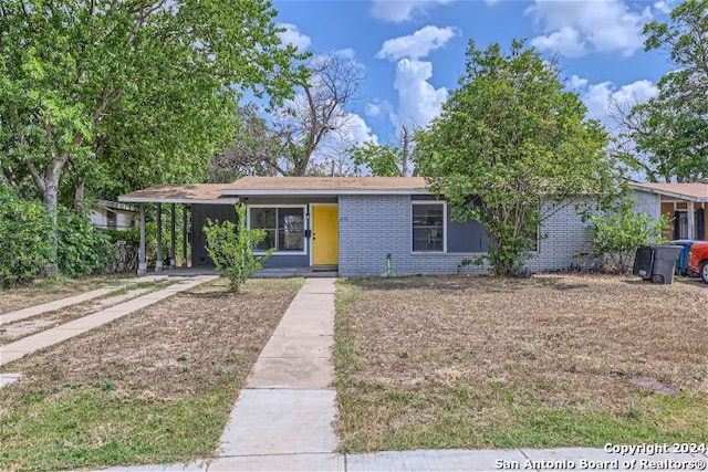 view of front of house with a carport