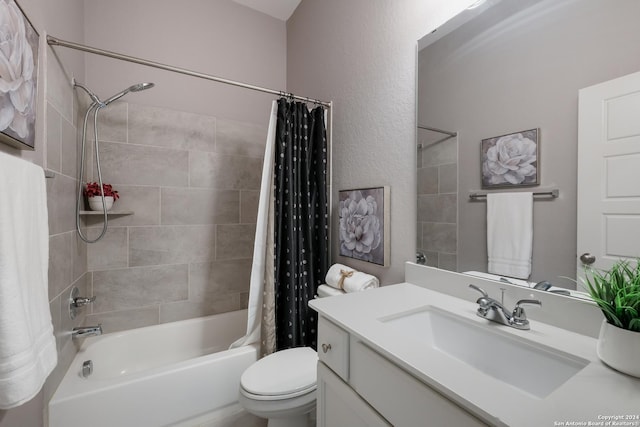 full bathroom with vanity, toilet, and shower / tub combo