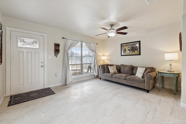 living room featuring ceiling fan