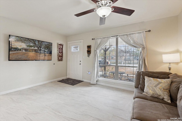 living room featuring ceiling fan