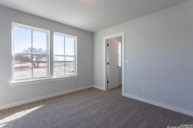 view of carpeted spare room