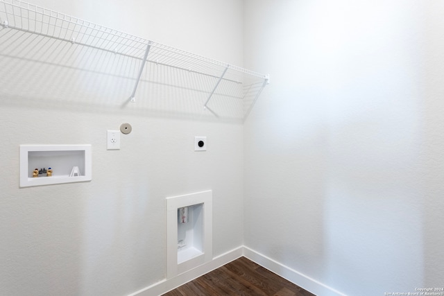 washroom with hookup for an electric dryer, hookup for a gas dryer, hardwood / wood-style floors, and washer hookup