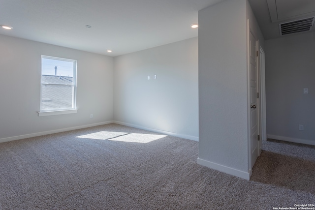 unfurnished room with carpet floors