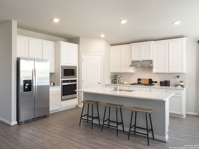 kitchen featuring white cabinets, sink, and stainless steel appliances