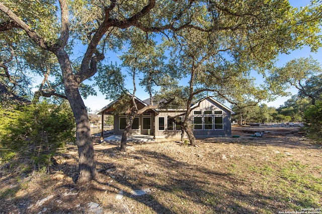 rear view of property with a patio