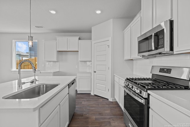 kitchen featuring white cabinetry, sink, and stainless steel appliances