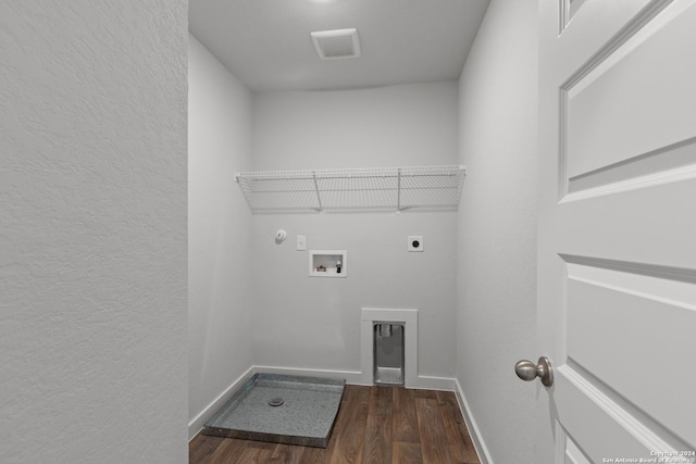 washroom with hookup for a gas dryer, hookup for a washing machine, dark wood-type flooring, and hookup for an electric dryer