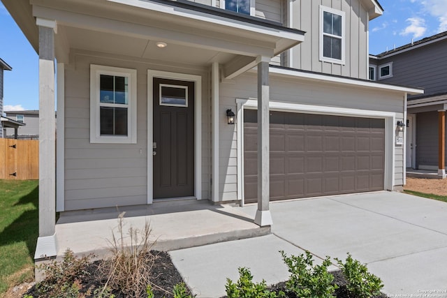 property entrance with a garage