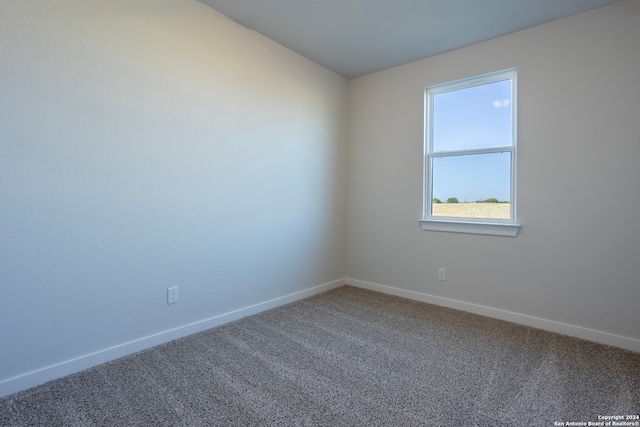 empty room with carpet flooring