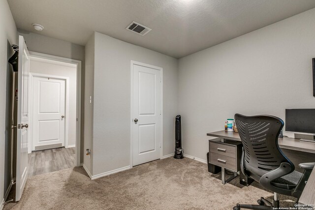 view of carpeted office space