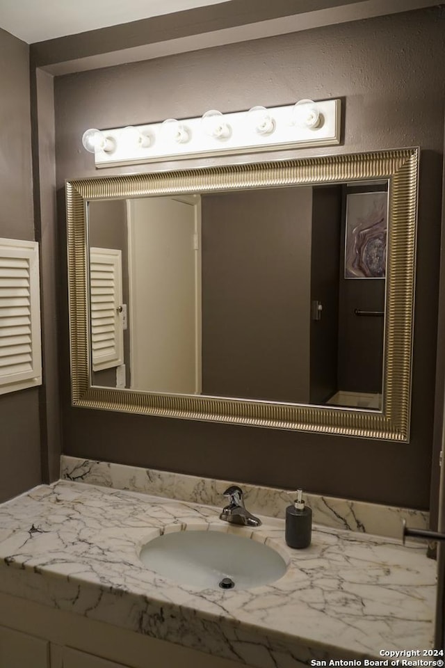 bathroom featuring vanity