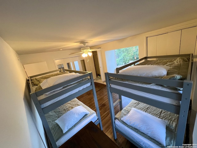 bedroom with hardwood / wood-style floors and ceiling fan