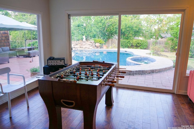 game room featuring hardwood / wood-style floors