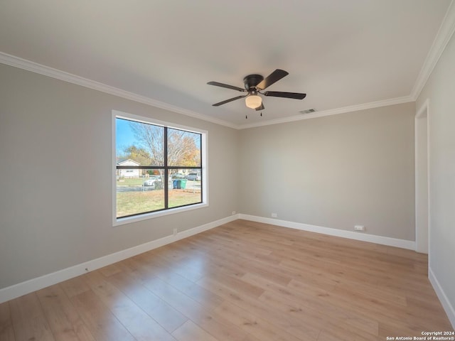 unfurnished room featuring light hardwood / wood-style floors, ceiling fan, and crown molding