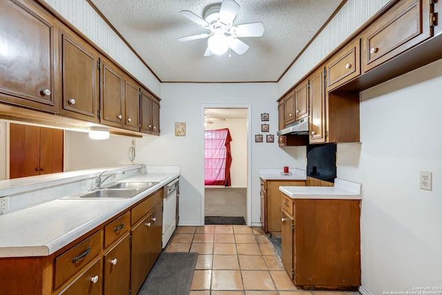 kitchen featuring ceiling fan, dishwasher, sink, crown molding, and a textured ceiling