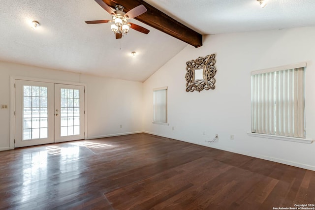 unfurnished room with french doors, a textured ceiling, ceiling fan, dark wood-type flooring, and lofted ceiling with beams